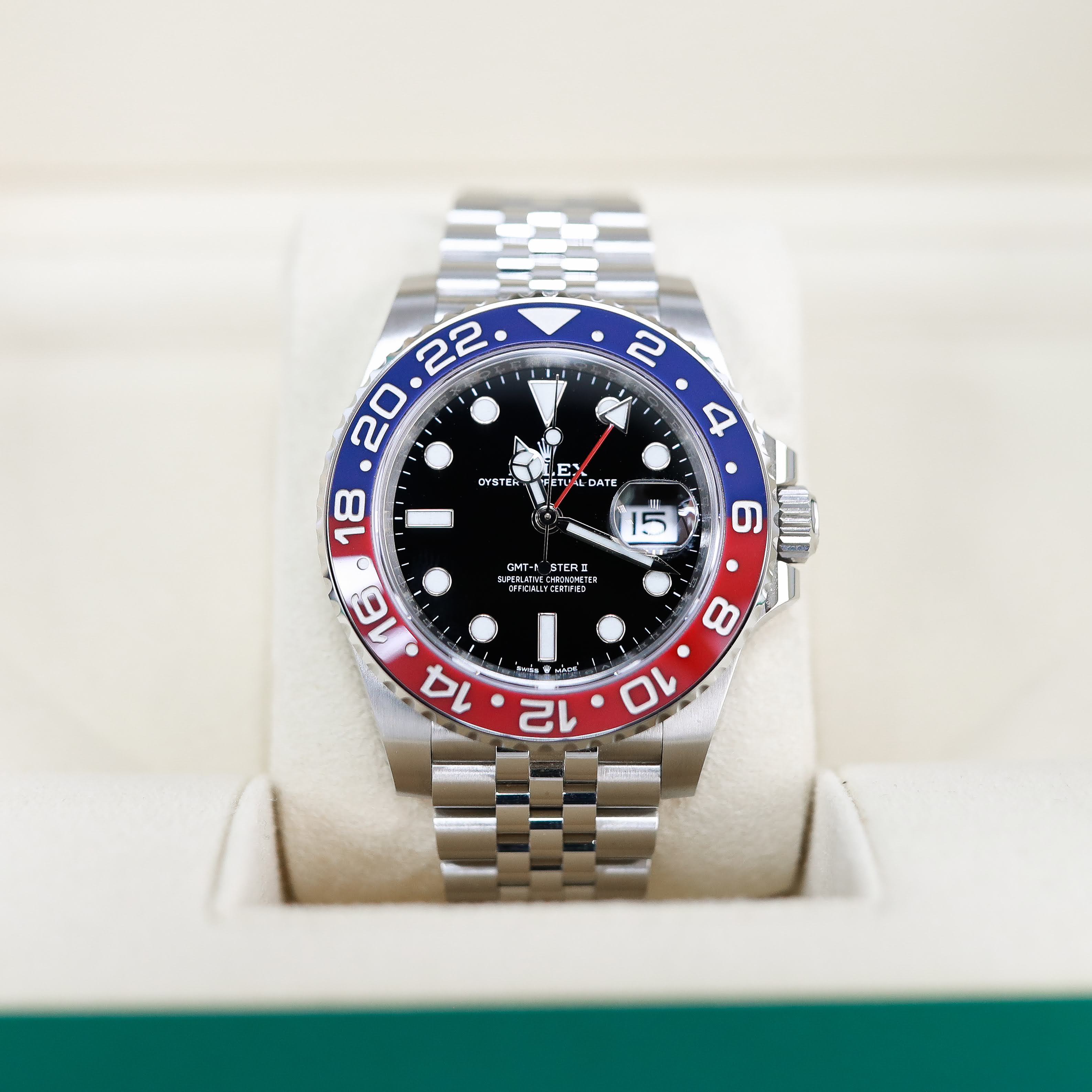 Rolex watch with blue and red dial