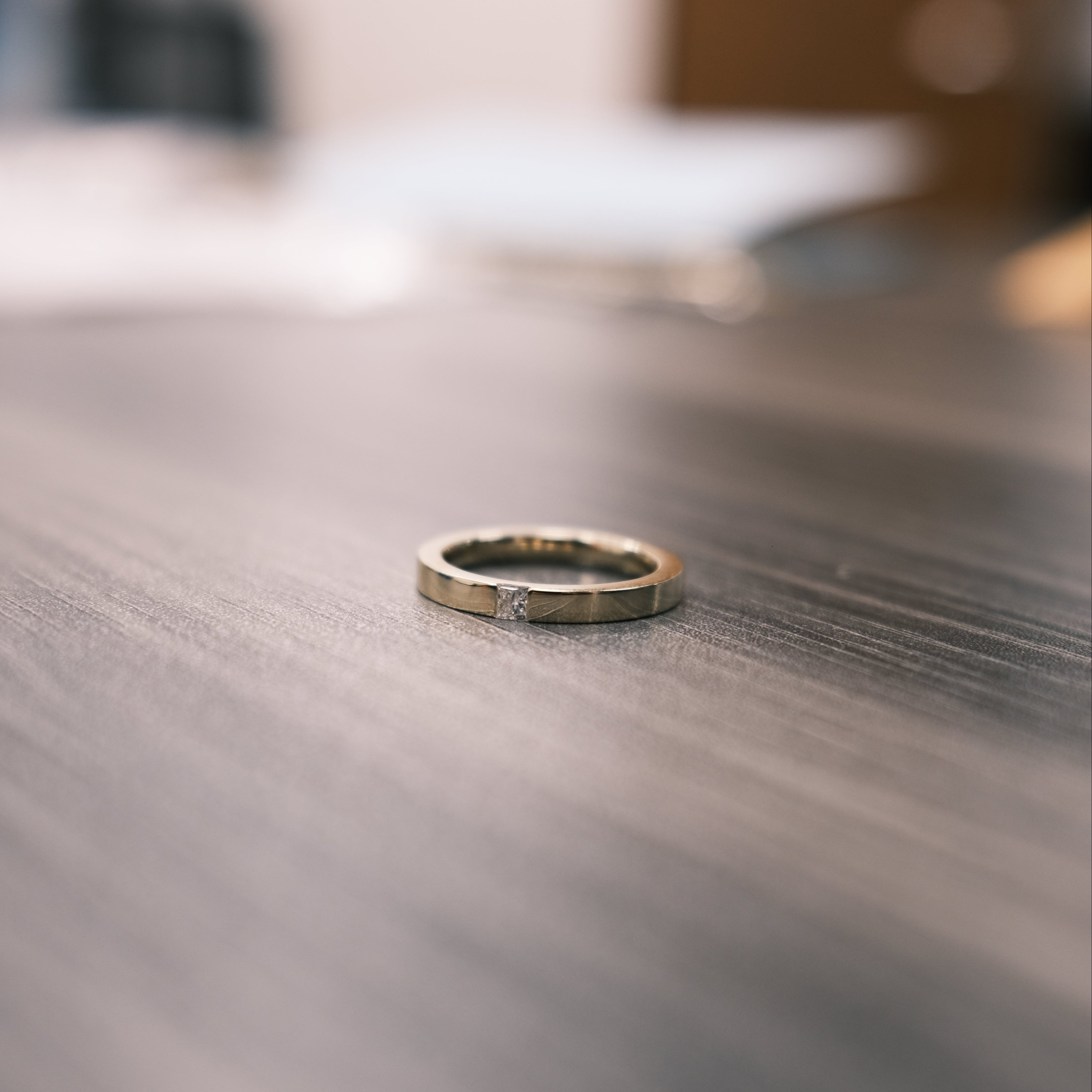 MB wedding band ring on the table