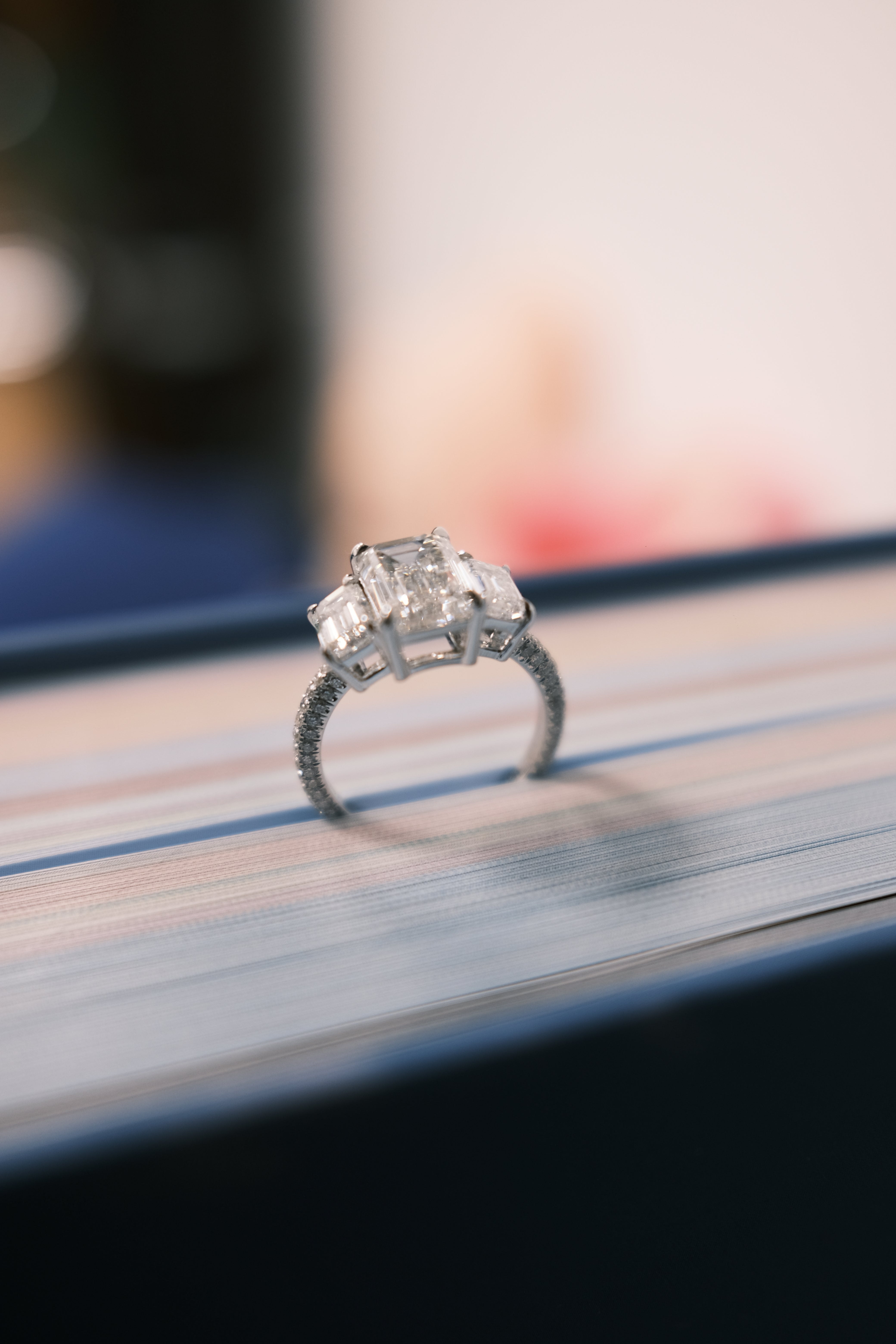 CA 3 stone emerald cut diamond ring side details