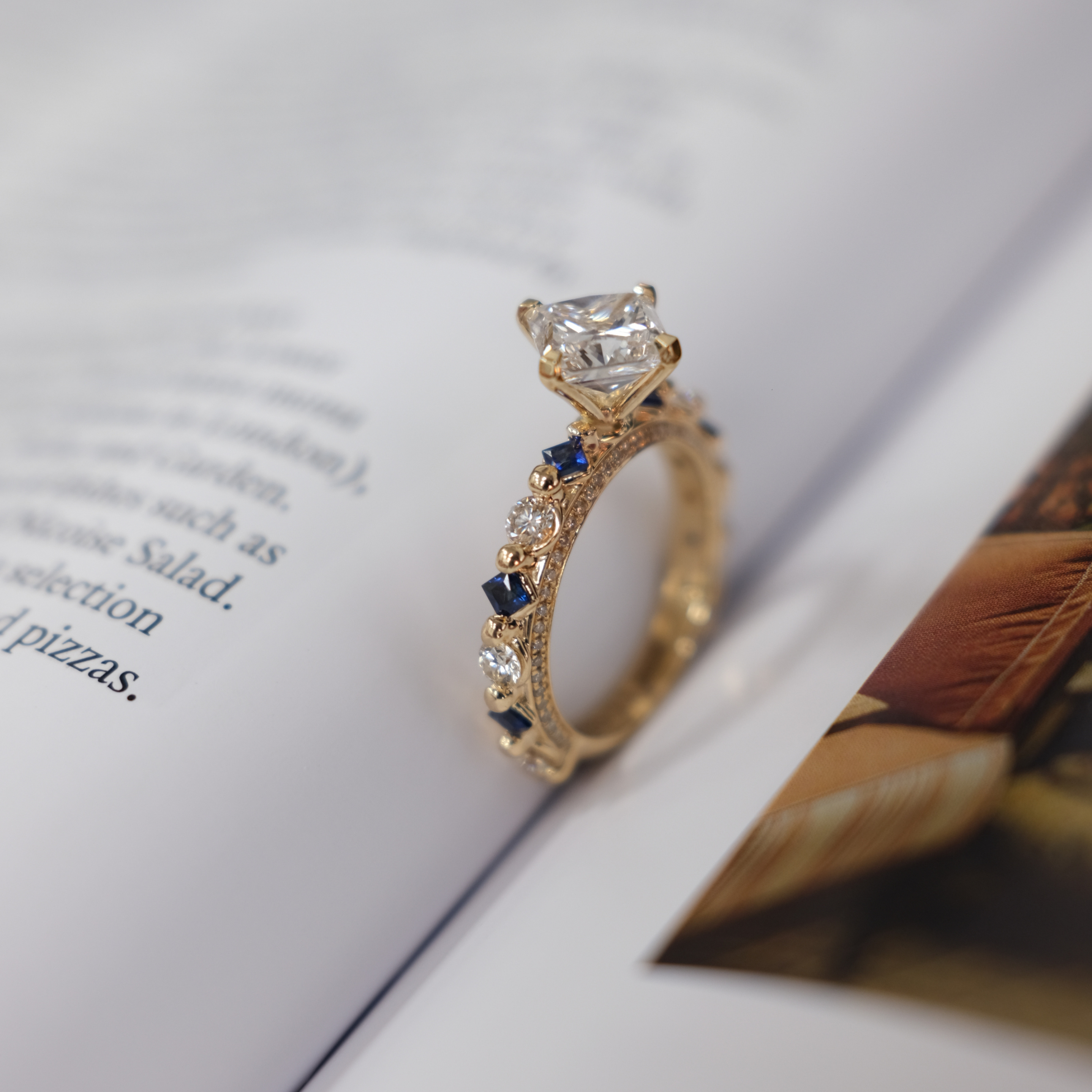 JA Diamond Solitaire ring with sapphire  & Diamond melees on the band side image